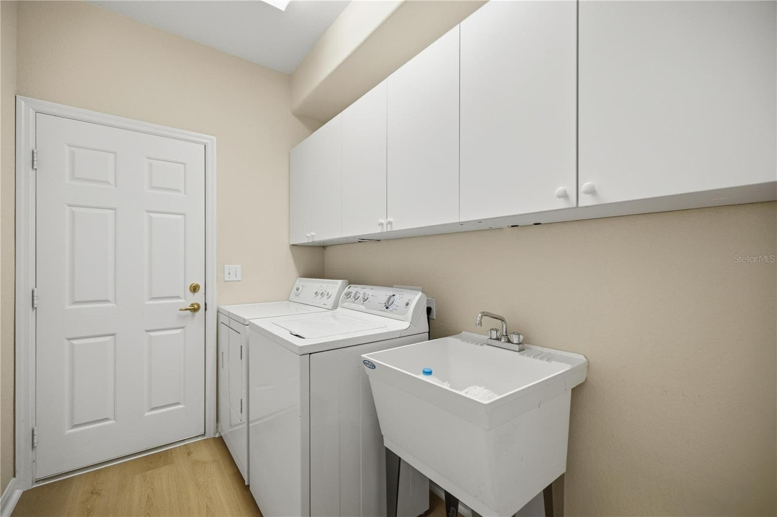 Inside laundry room with storage! - 9495 SE 130TH PLACE RD, SUMMERFIELD