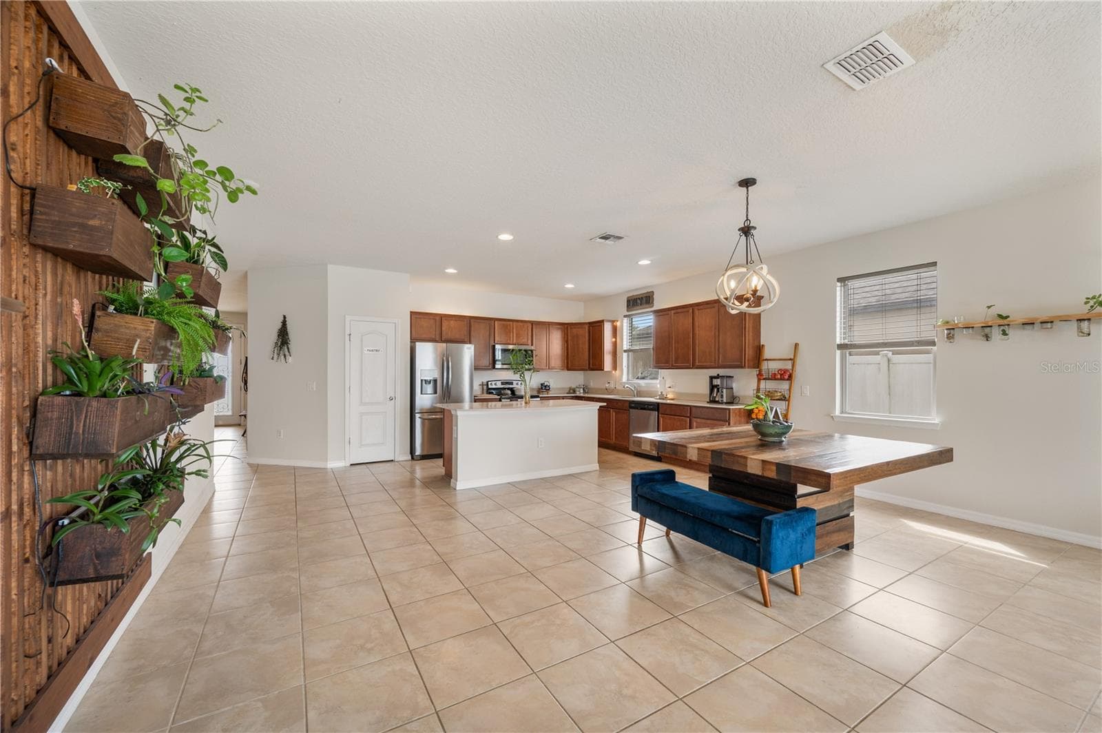 Open Floor Plan / Kitchen / Dining Room / Living Room / Live Plant Wall - 8751 RINDGE RD, POLK CITY