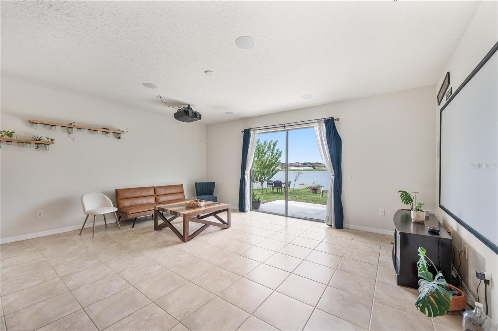 Living Room with Pond Views - 8751 RINDGE RD, POLK CITY