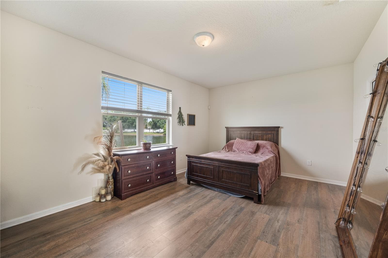 Primary Bedroom with Pond Views - 8751 RINDGE RD, POLK CITY