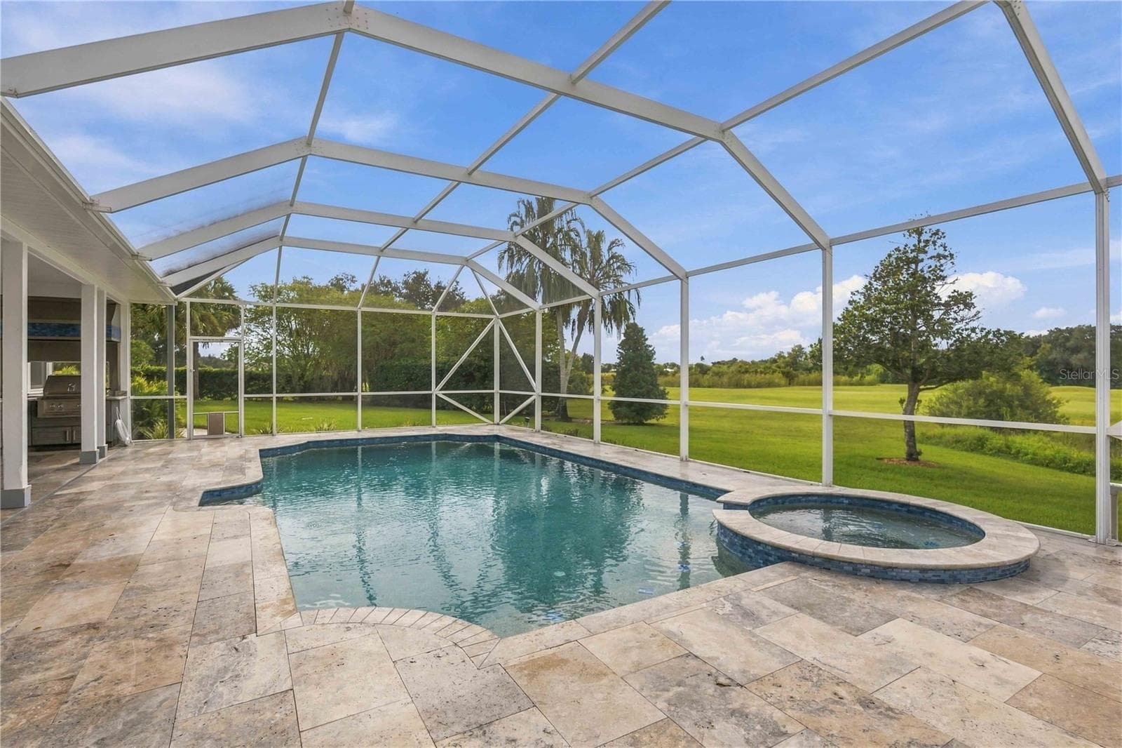 Pool overlooking the golf course - 8543 SW AVIARY RD, ARCADIA