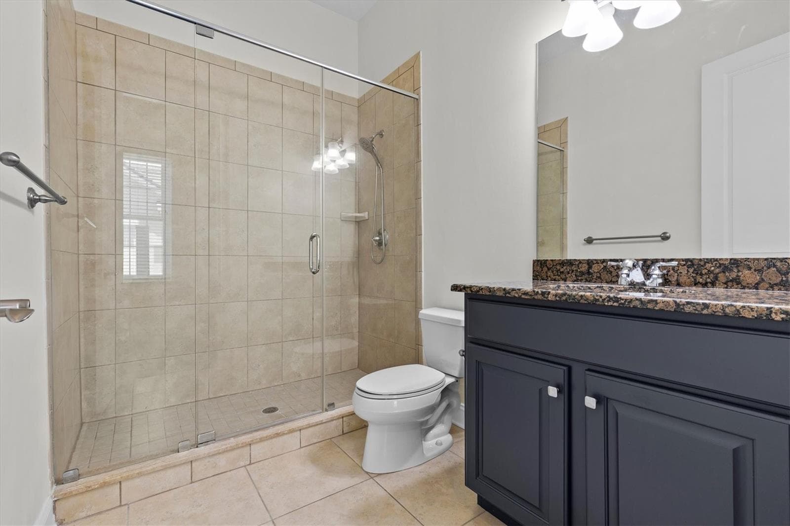 Full bath w/ shower serves in-law suite. - 480 GILMAN PL N, ST PETERSBURG