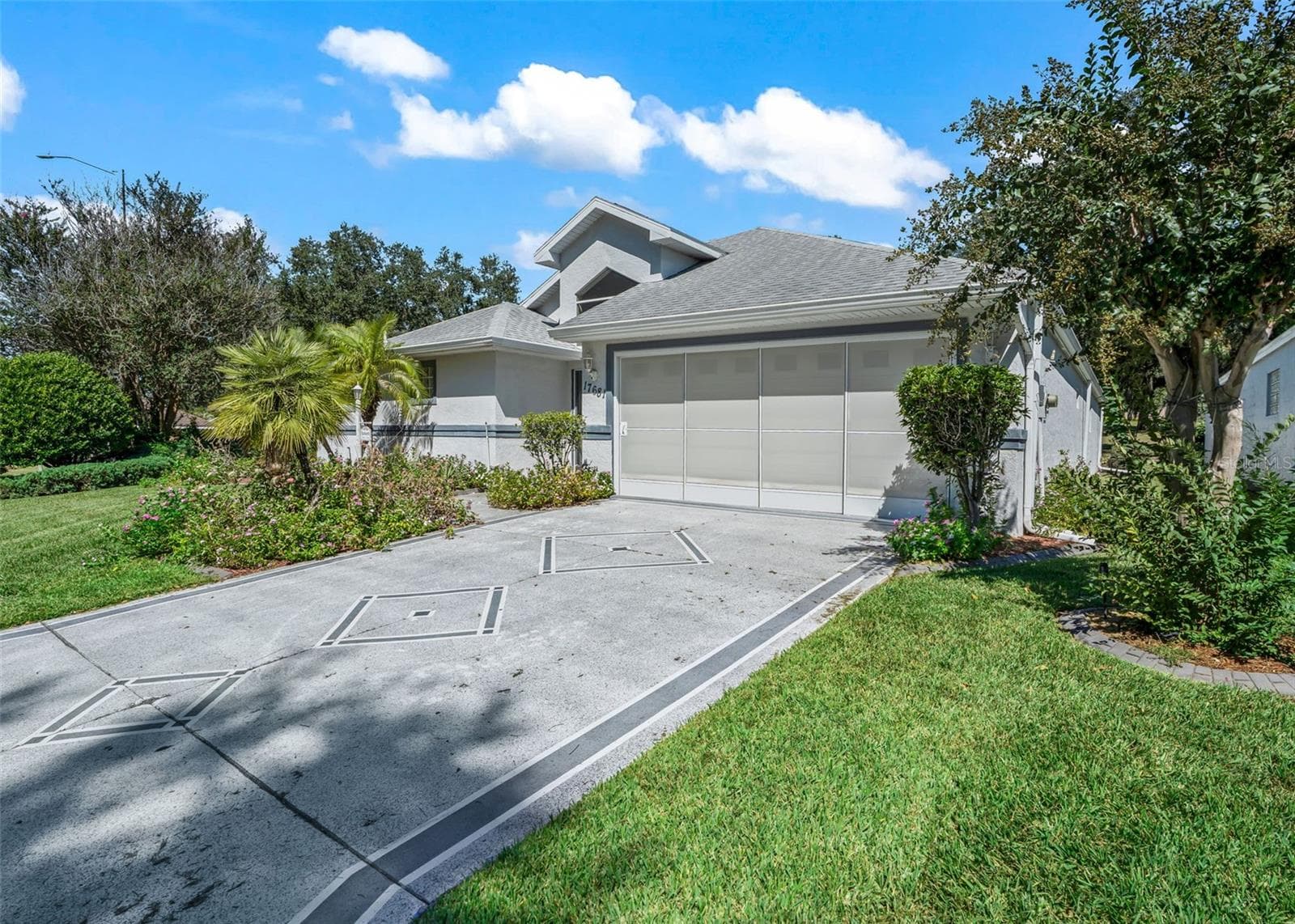 Painted Concrete Driveway - 17681 SE 115TH CT, SUMMERFIELD