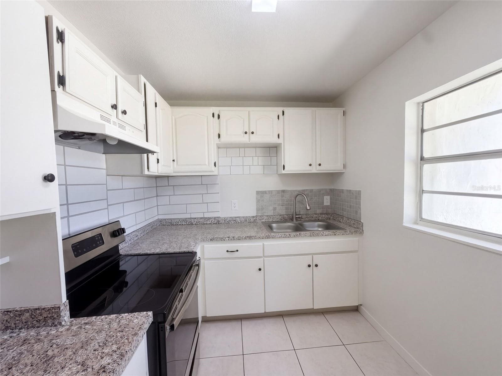 Single Family Residence at 7916 ENDIVE AVE, TAMPA, photo 9 of 21