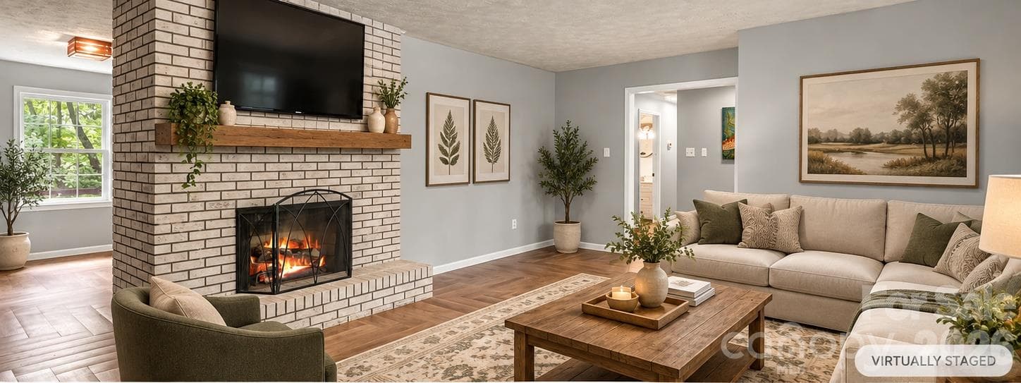 virtually staged main level living room - 92 Greenwood Acres Drive, Mills River