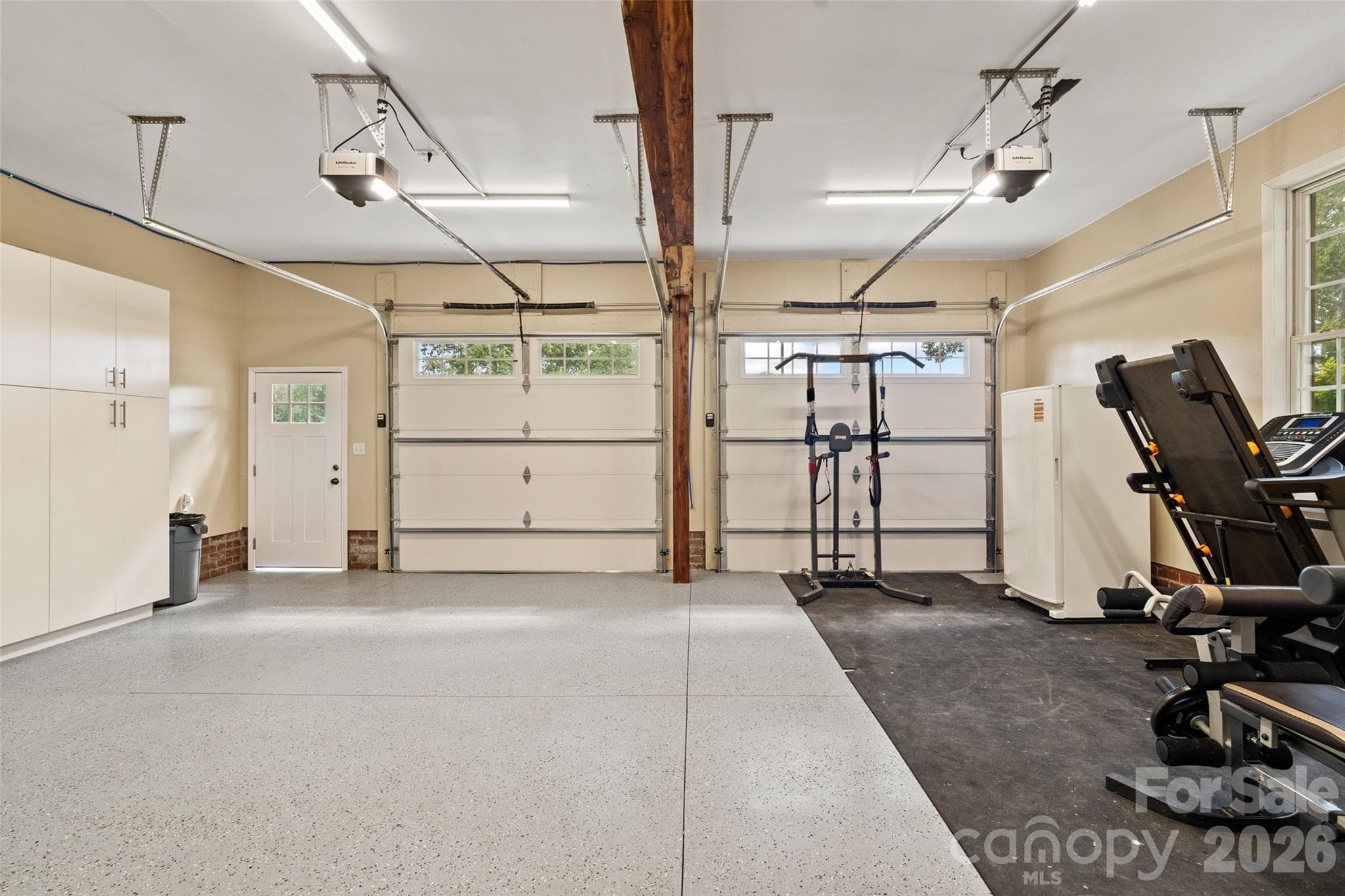 Heated and cooled garage with epoxy flooring and cedar accents [32.7ft x 27ft] - 996 Beamguard Road, Clover