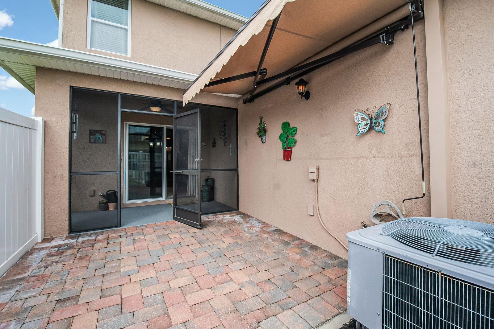 Patio with Awning - 4800 RIVERWALK DR, ST CLOUD