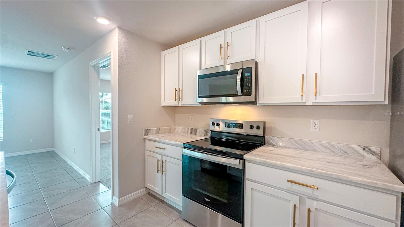 Kitchen with Gold Hardware - 12293 MOUNTAIN ISLAND TRL, PARRISH