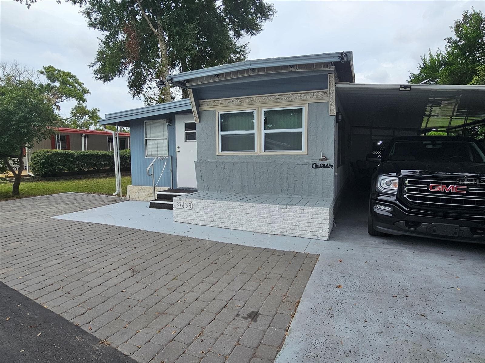 Mobile Home at 37433 HAMMOND DR, ZEPHYRHILLS, photo 2 of 29