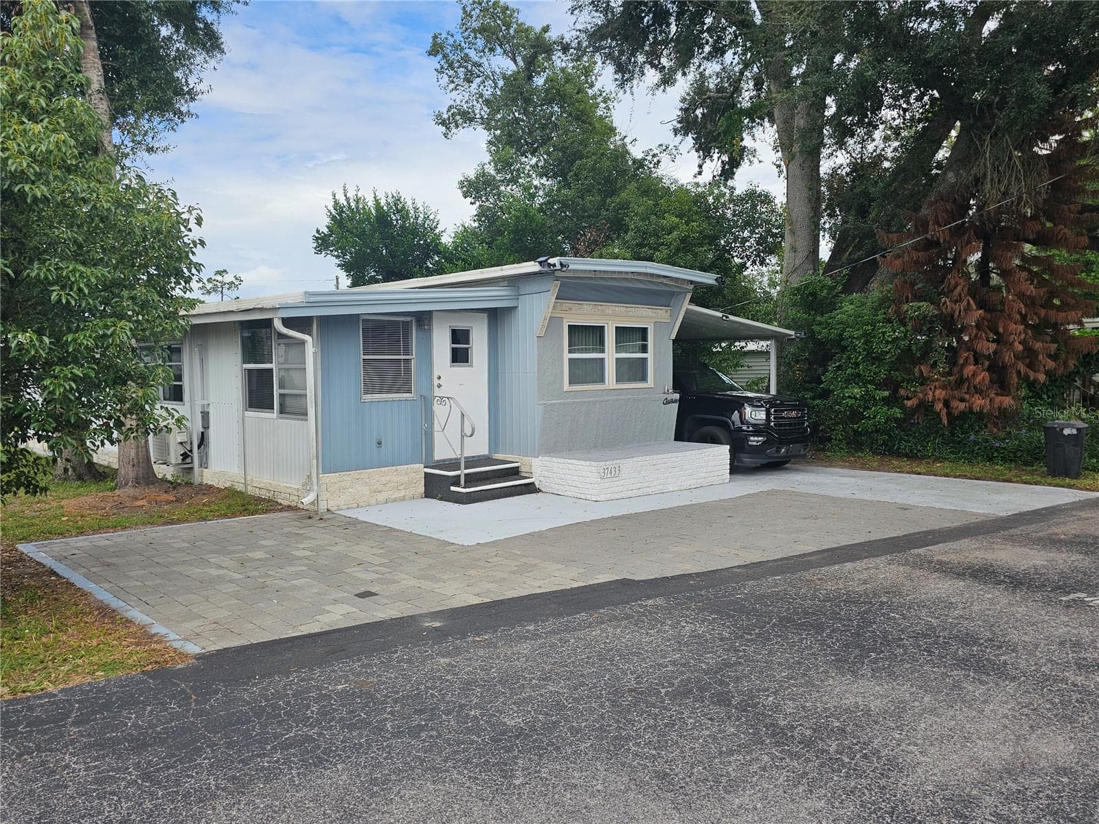 Mobile Home at 37433 HAMMOND DR, ZEPHYRHILLS, photo 3 of 29