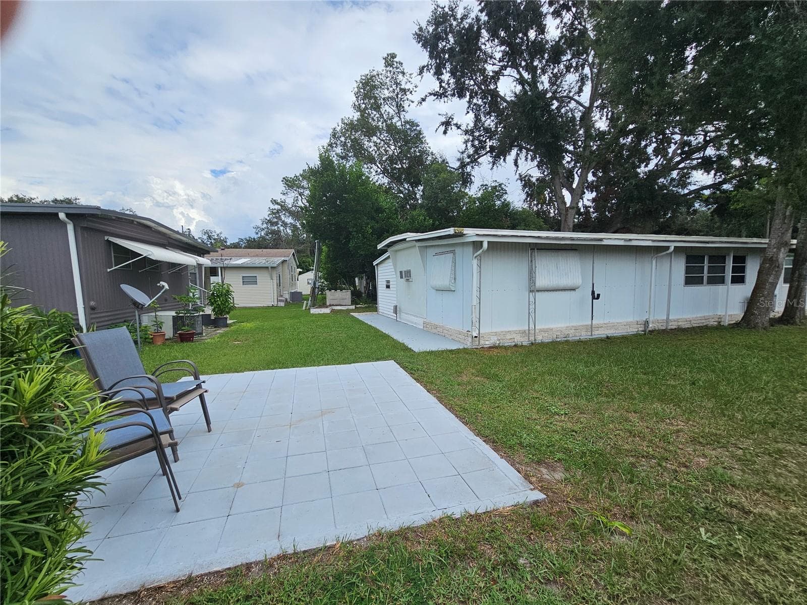 Mobile Home at 37433 HAMMOND DR, ZEPHYRHILLS, photo 4 of 29