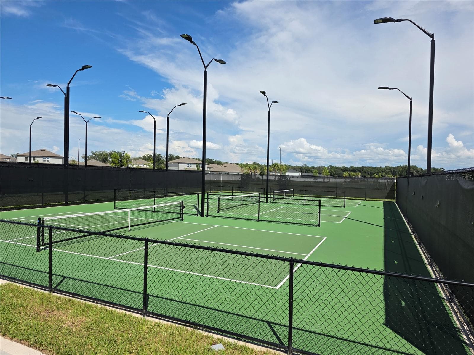 Six pickleball courts are in the recreation area. - 4745 SW 83RD LOOP, OCALA