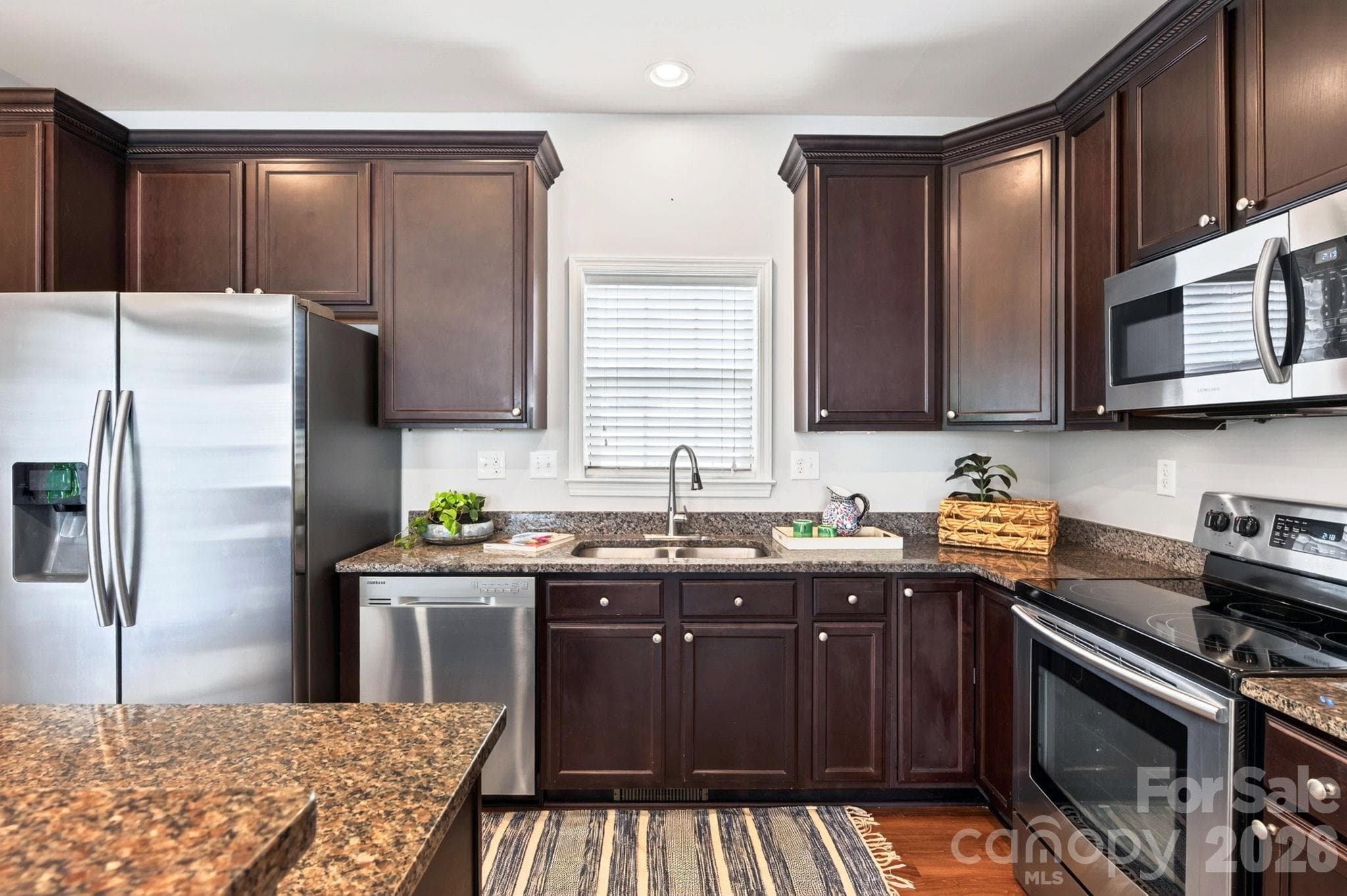 Kitchen with stainless steel appliances - 62 Kirby Road, Asheville