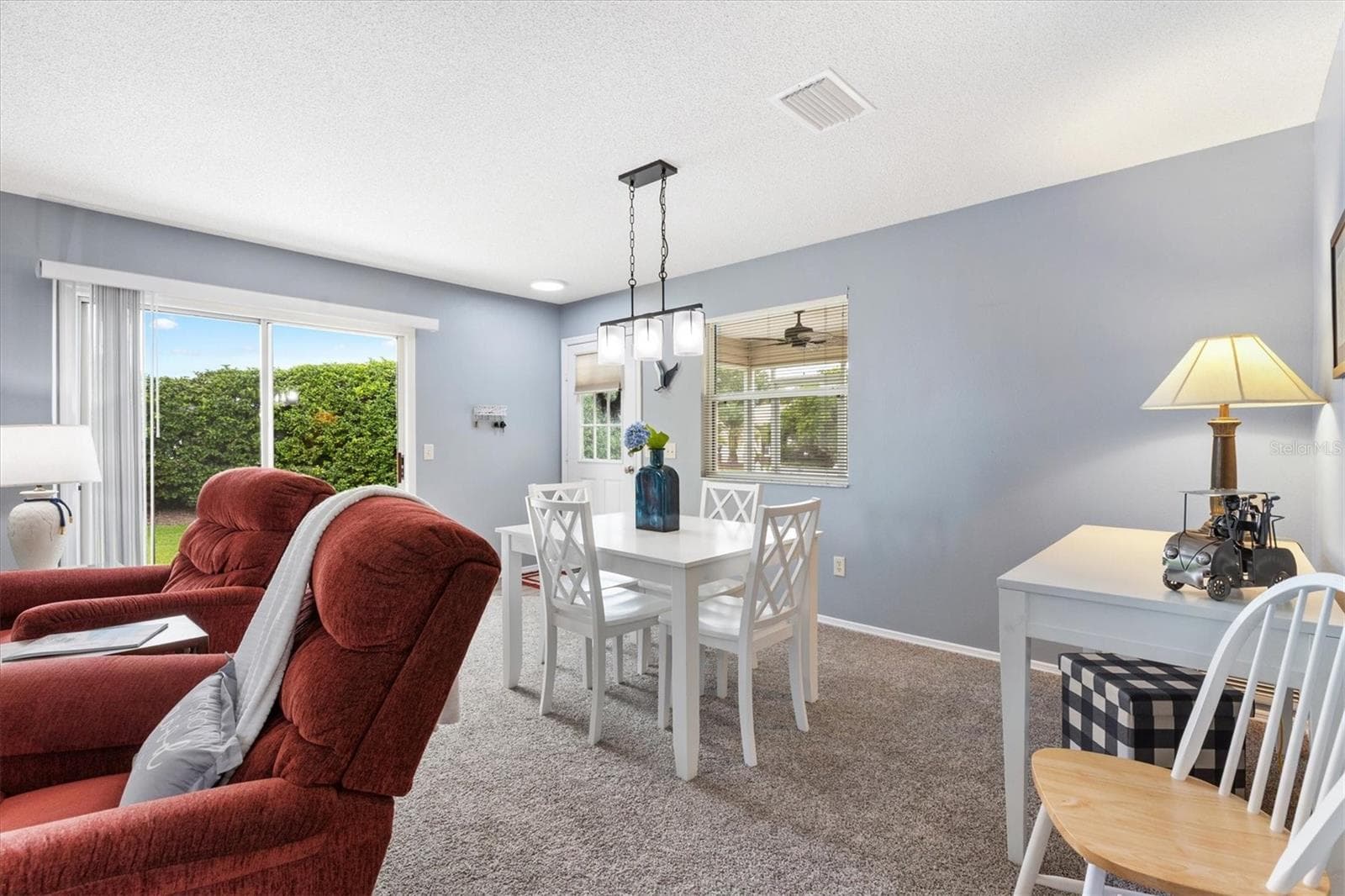OPEN CONCEPT LIVING ROOM & KITCHEN,DINING ROOM - 1234 EAGLE RIDGE DR, THE VILLAGES