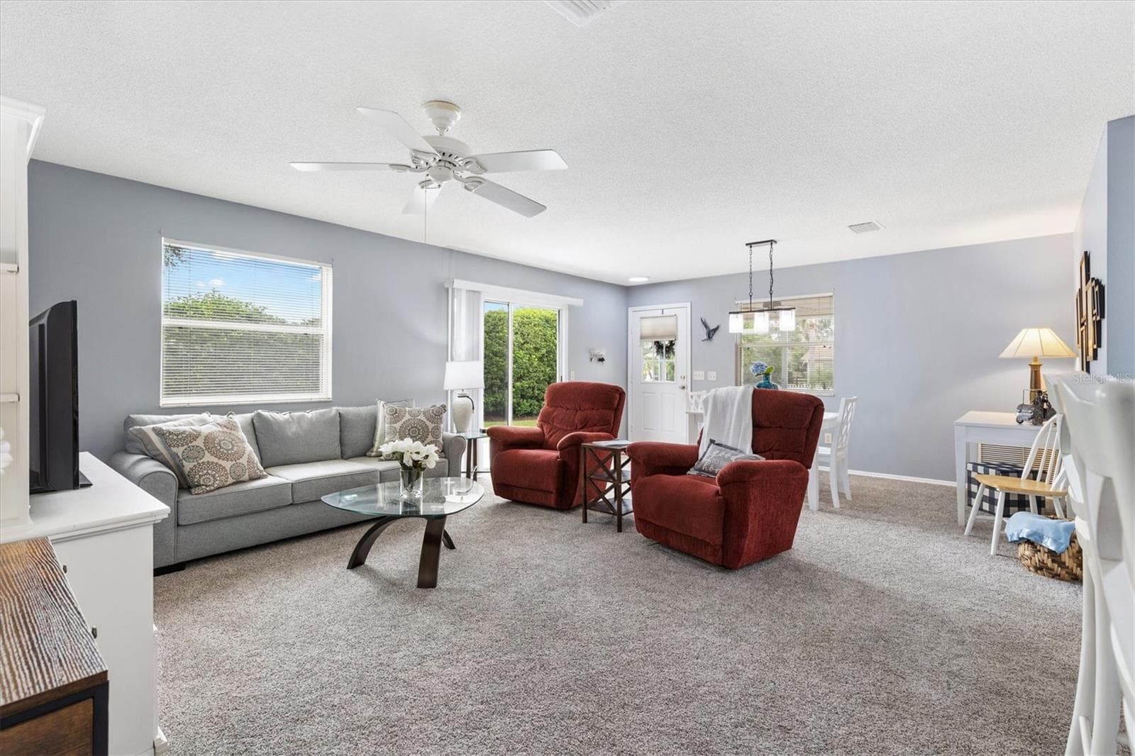 OPEN CONCEPT LIVING ROOM & KITCHEN,DINING ROOM - 1234 EAGLE RIDGE DR, THE VILLAGES