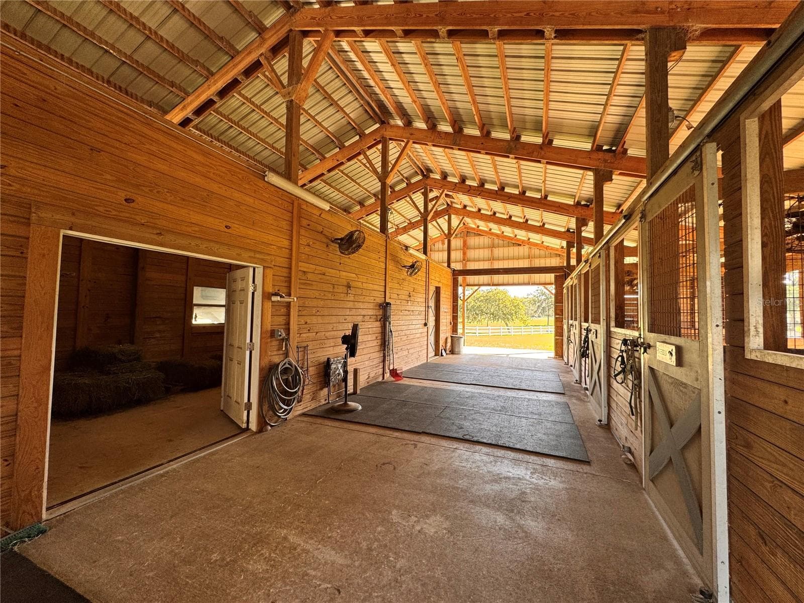 Generous barn workspace with room for everyday equestrian needs - 6722 W SENTINEL BLUFF PATH, BEVERLY HILLS