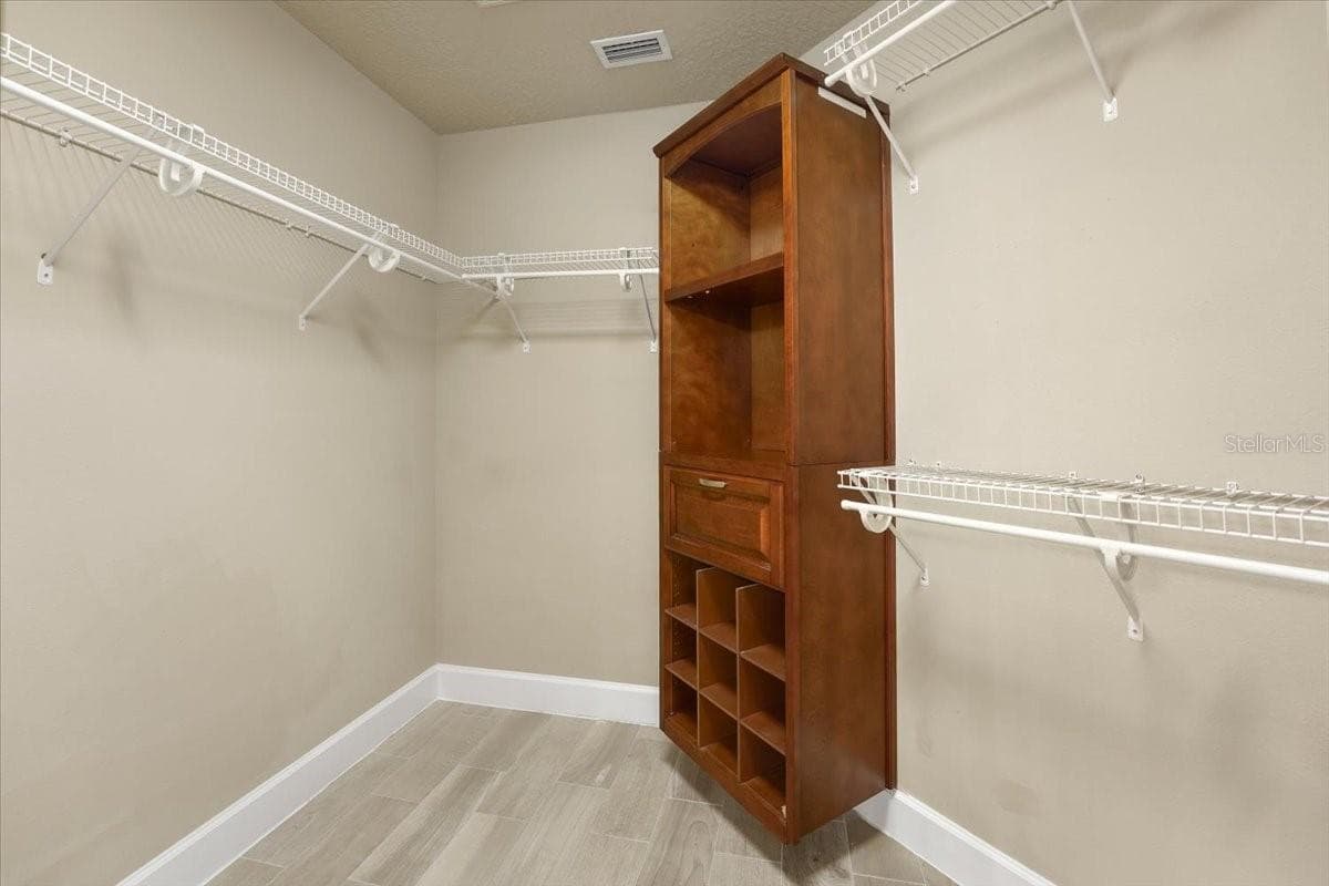 Primary Walk-in Closet #1 - 6627 MERRYVALE LN, PORT ORANGE
