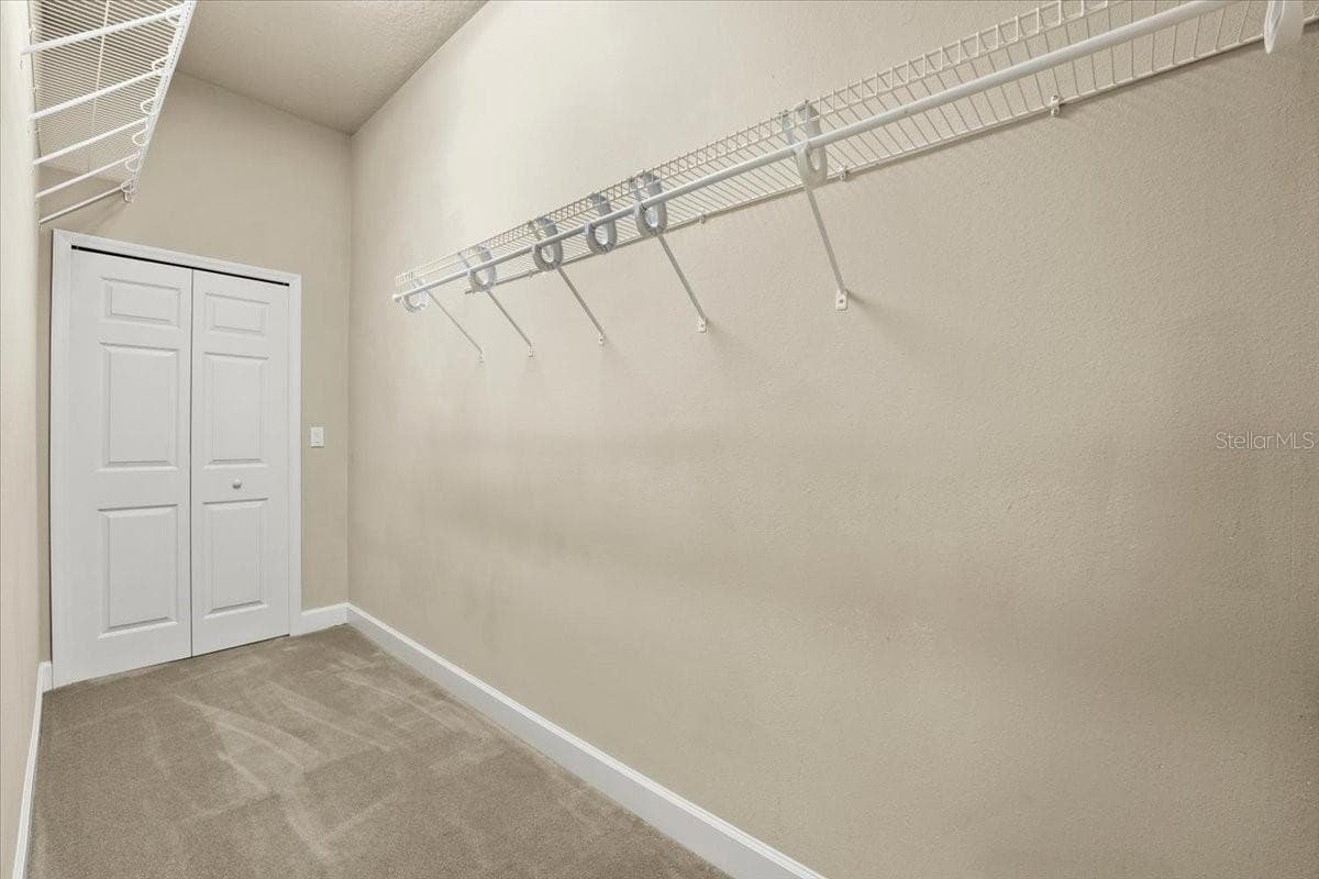 Primary Walk-in Closet #2 - 6627 MERRYVALE LN, PORT ORANGE