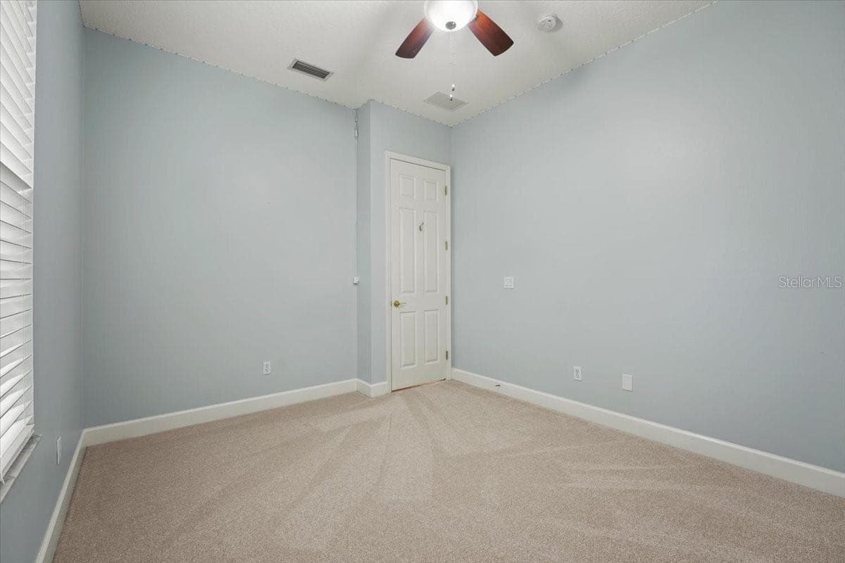 Secondary Bedroom (Yard view) - 6627 MERRYVALE LN, PORT ORANGE