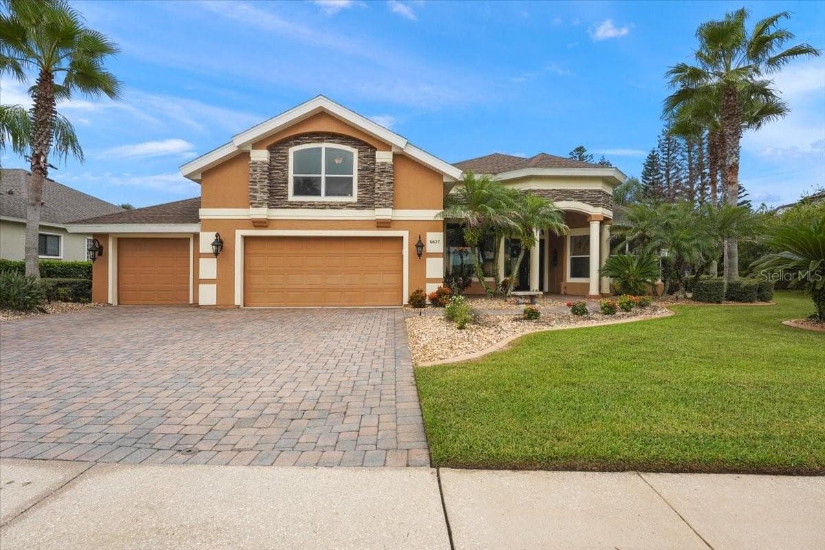 Front view of home - 6627 MERRYVALE LN, PORT ORANGE