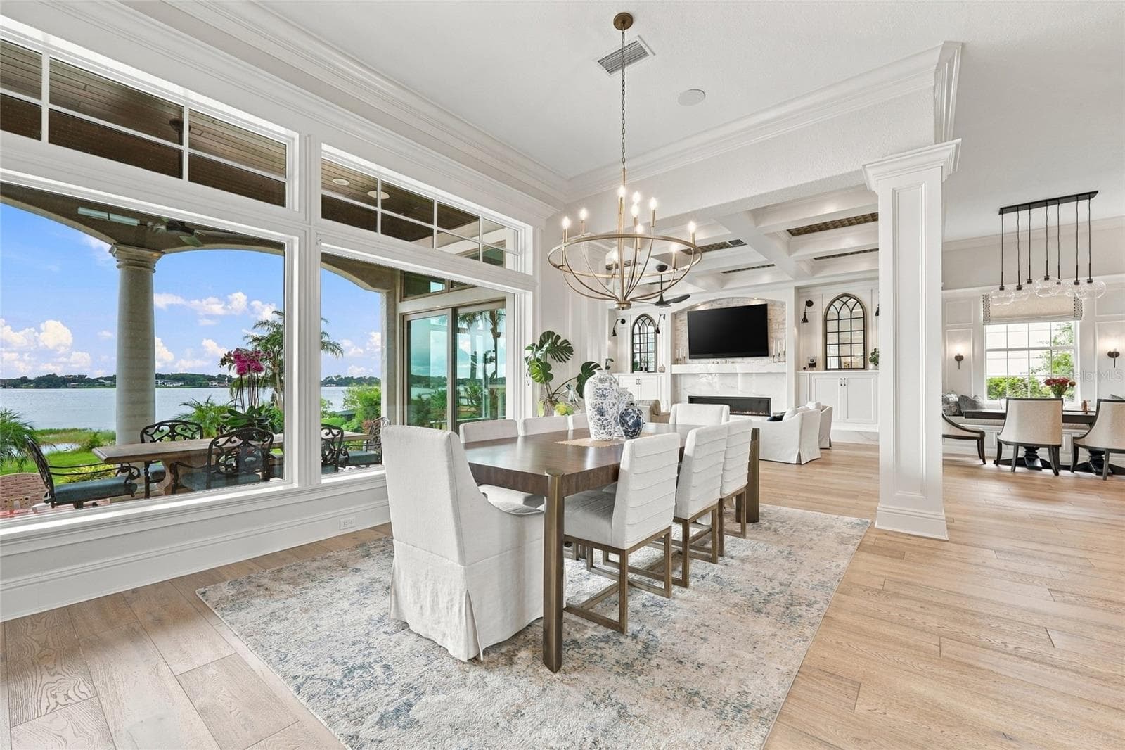 DINING AREA WITH VIEWS OF LAKE DOWN - 9602 MAYWOOD DR, WINDERMERE