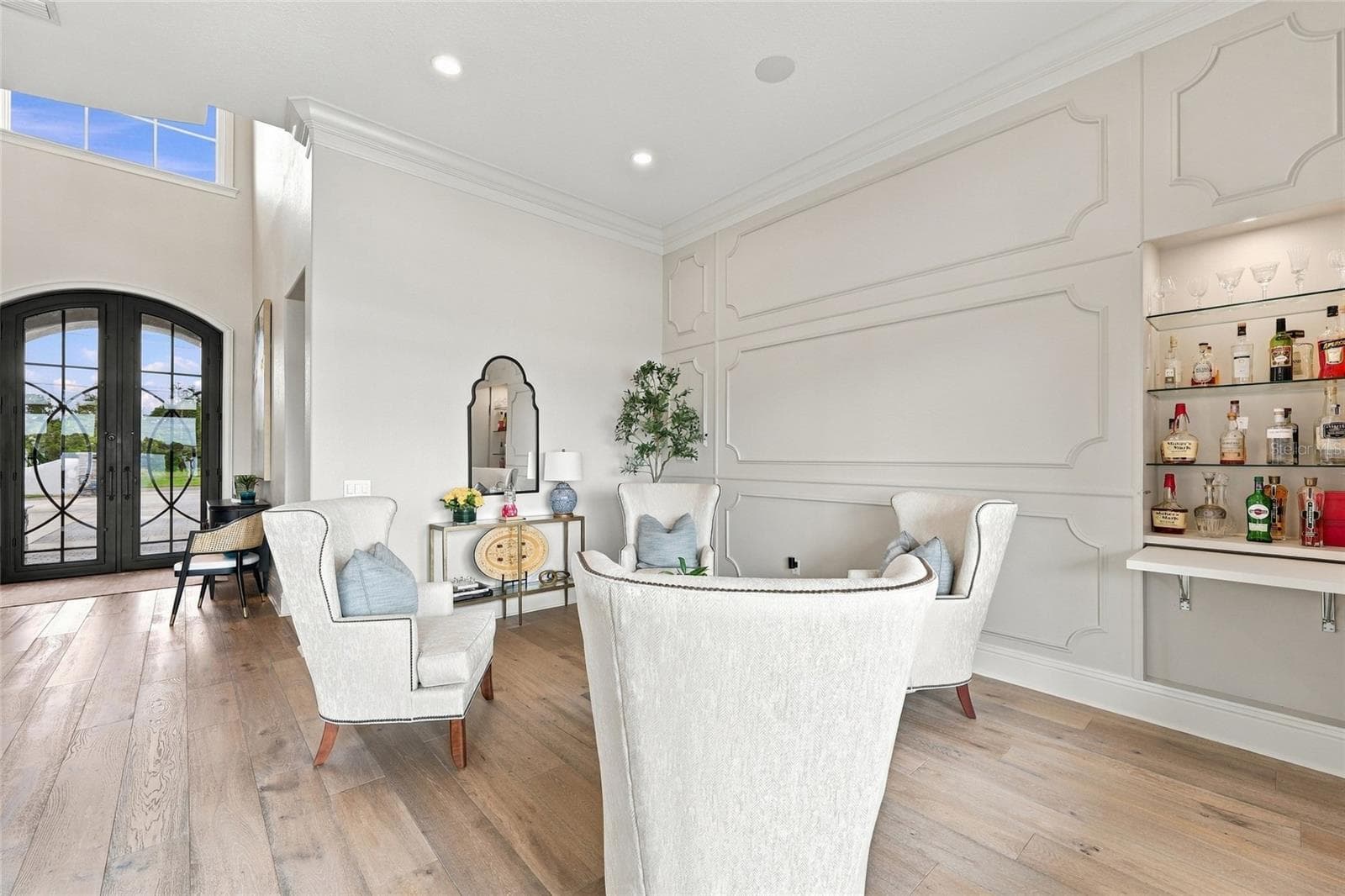 FORMAL SITTING AREA WITH HIDDEN BAR - 9602 MAYWOOD DR, WINDERMERE