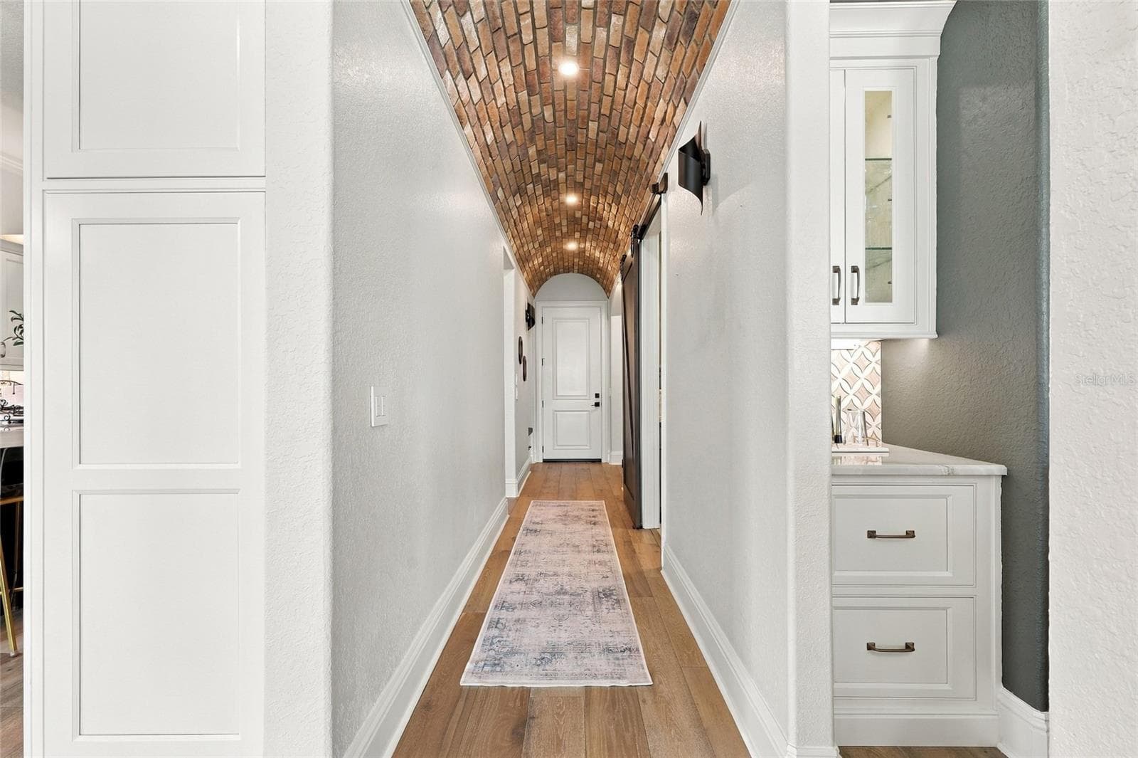 HALLWAY ENTRANCE FROM GARAGE - 9602 MAYWOOD DR, WINDERMERE