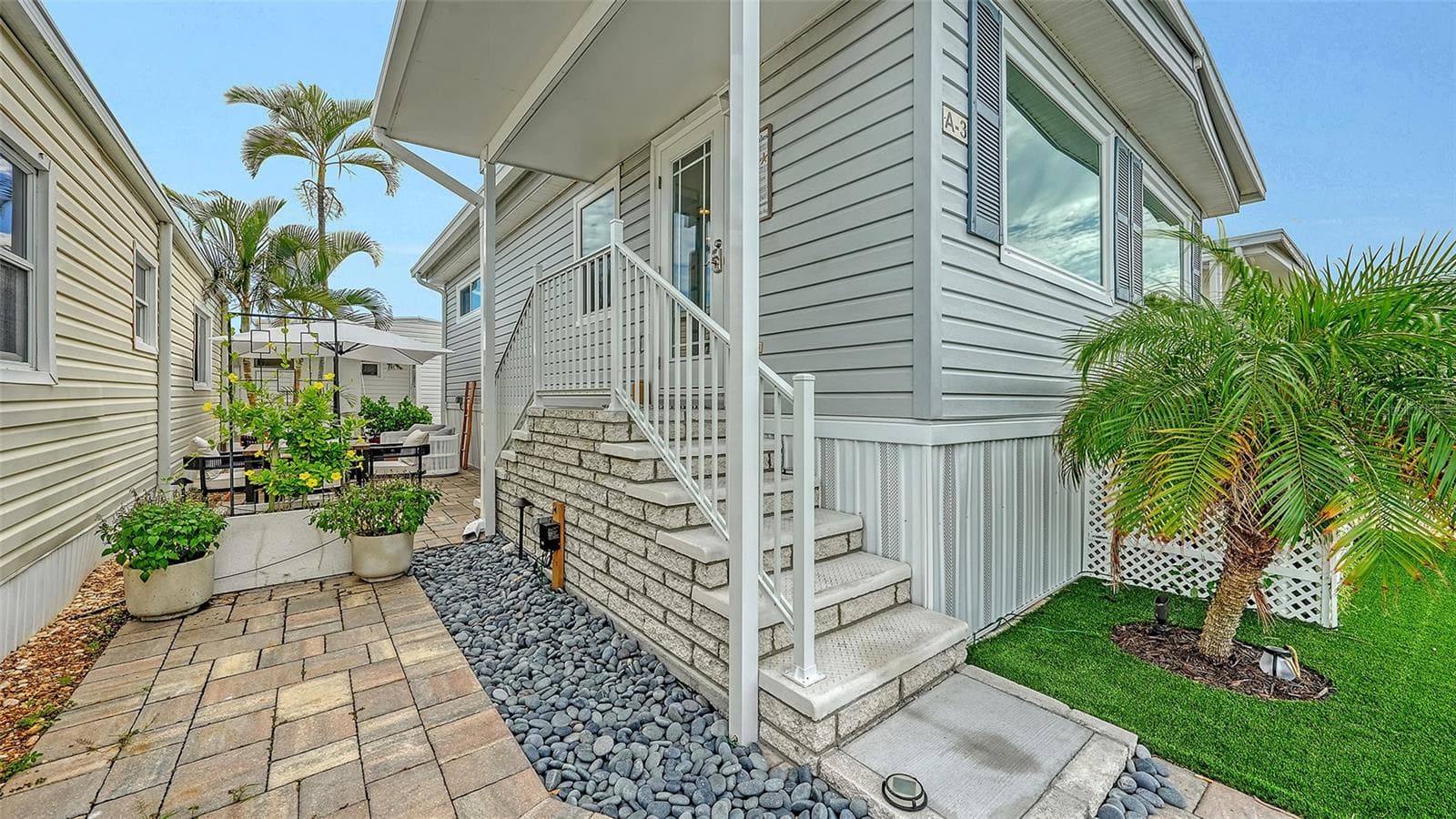 outdoor patio facing east - 3710 GULF OF MEXICO DR #A3, LONGBOAT KEY