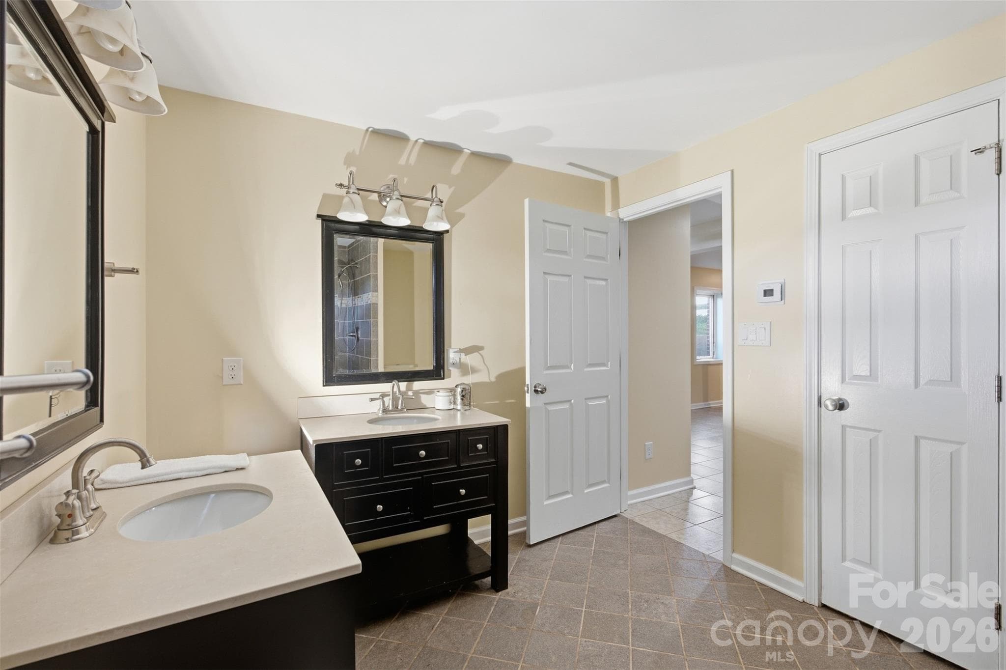 Heated floors in bathroom of second Primary on lower level. Wheelchair accessible. - 3881 Summerow Road, Maiden