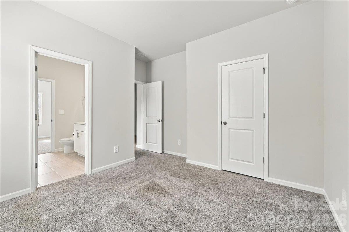 Bed 3 with jack-n-jill bath.  Lots of natural light. - 151 Bird Dog Drive, Mooresville