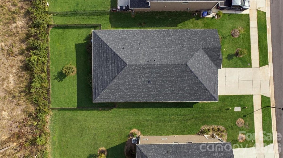 Aerial view showing no back neighbor- just some trees...  Great fenced yard! - 151 Bird Dog Drive, Mooresville