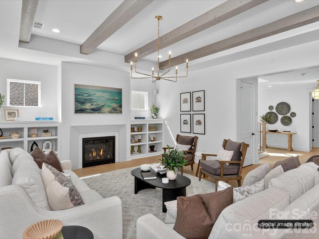 Stunning Beams anchor the space - 305 Weddington Grove Lane, Weddington