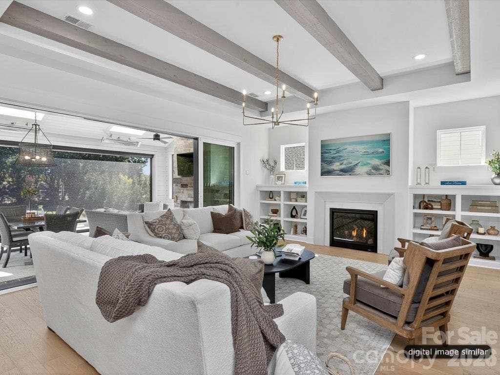 Great Room flows to the covered outdoor Terrace - 305 Weddington Grove Lane, Weddington
