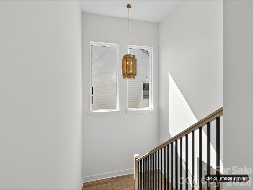 Oversized windows in staircase - 305 Weddington Grove Lane, Weddington