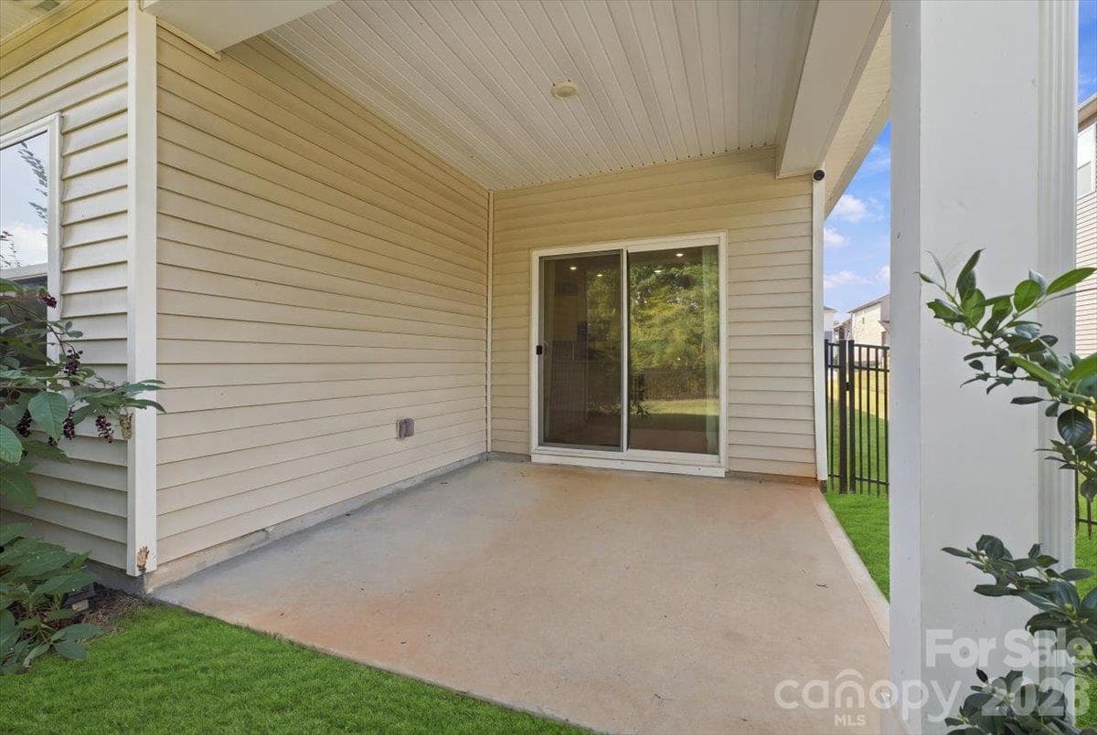 Covered patio off open floor plan- expand living and entertainment areas.  Could be screened in too! - 151 Bird Dog Drive, Mooresville