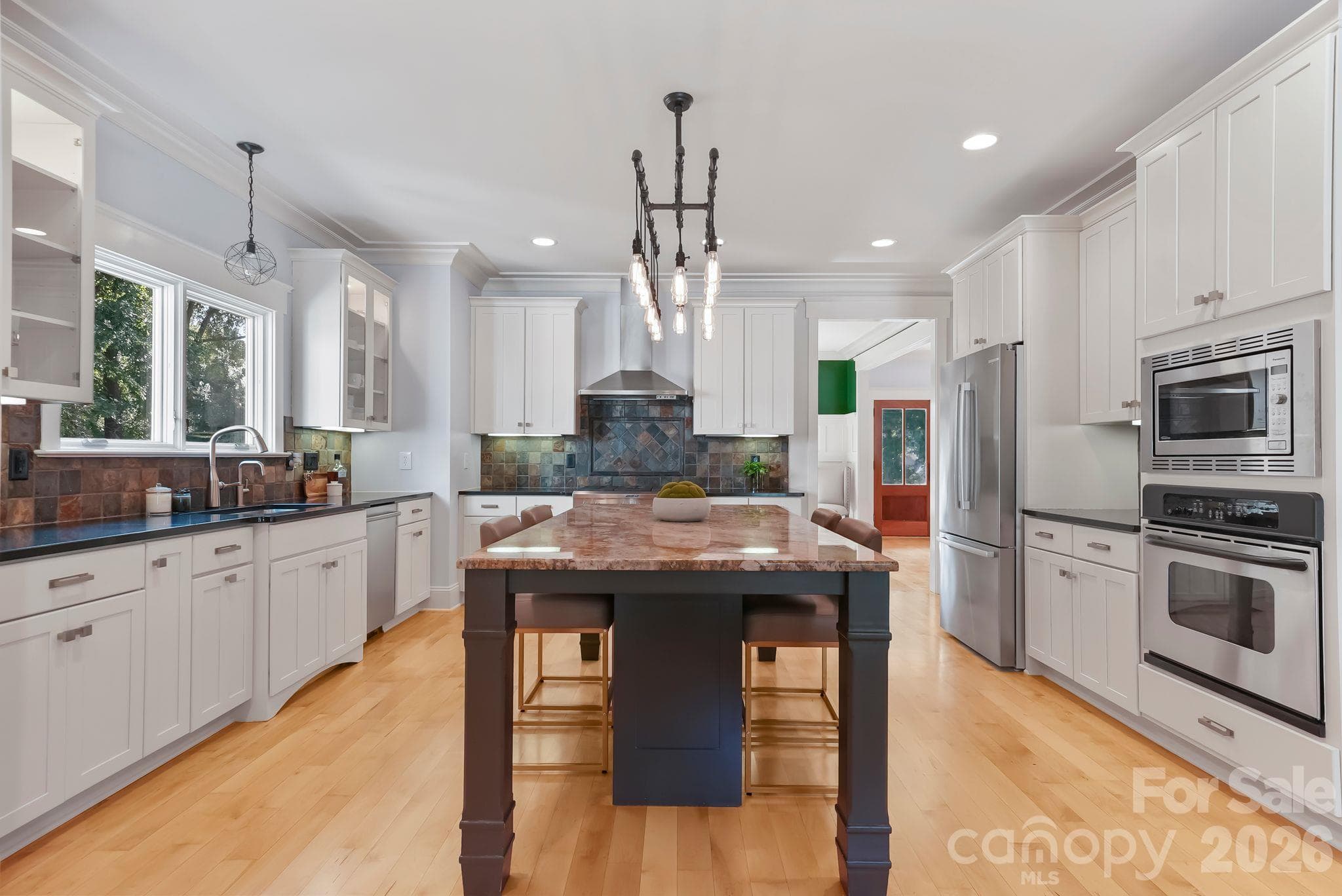 Large kitchen island plus stainless steel appliances - 268 Milford Circle, Mooresville