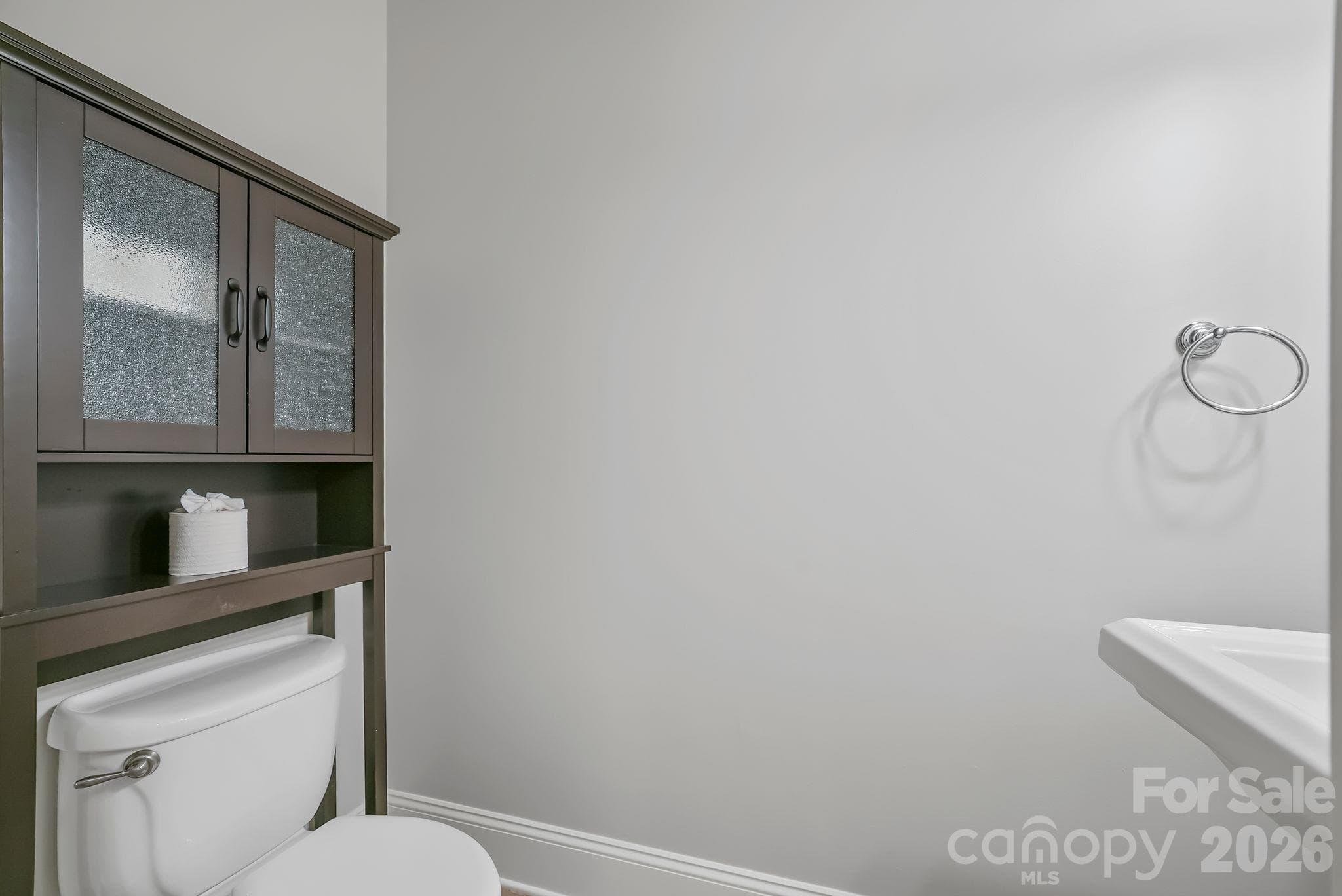 Upper level half bathroom off bonus room area. - 268 Milford Circle, Mooresville
