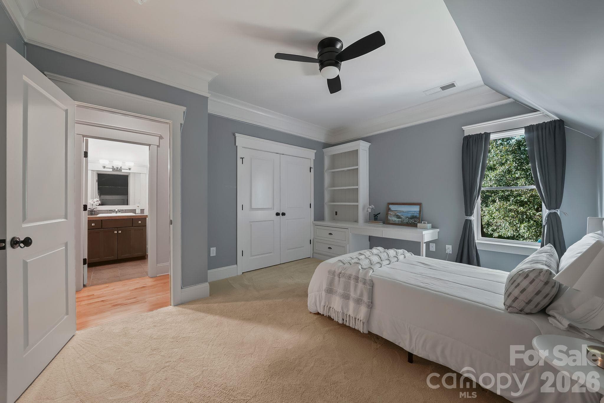 Upper level bedroom with built in desk and shelving - 268 Milford Circle, Mooresville