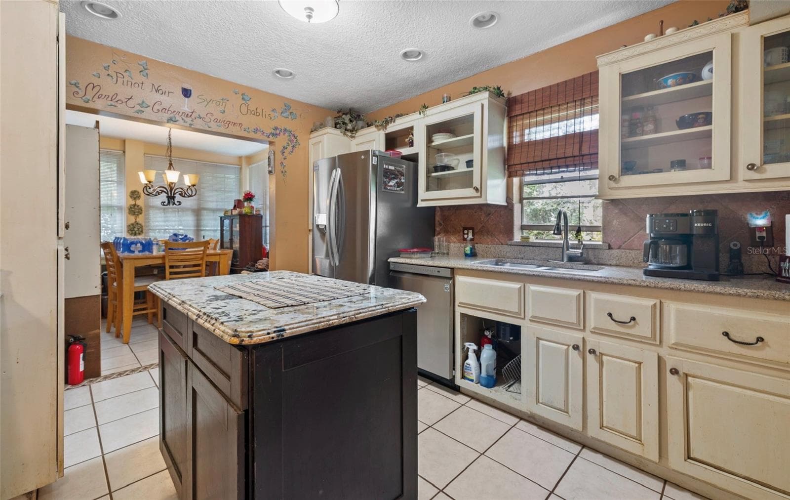 another view of kitchen into dining room - 8602 N ROME AVE, TAMPA