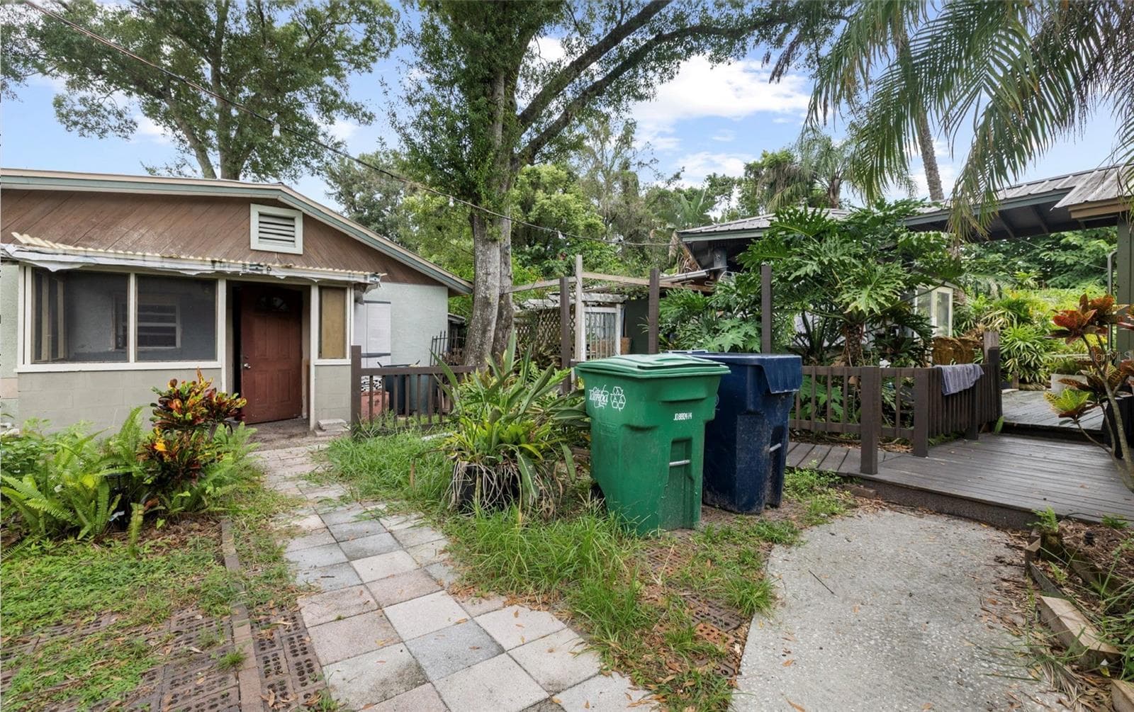 view showing the out building and the walkway to the screened lanai and gazebo - 8602 N ROME AVE, TAMPA