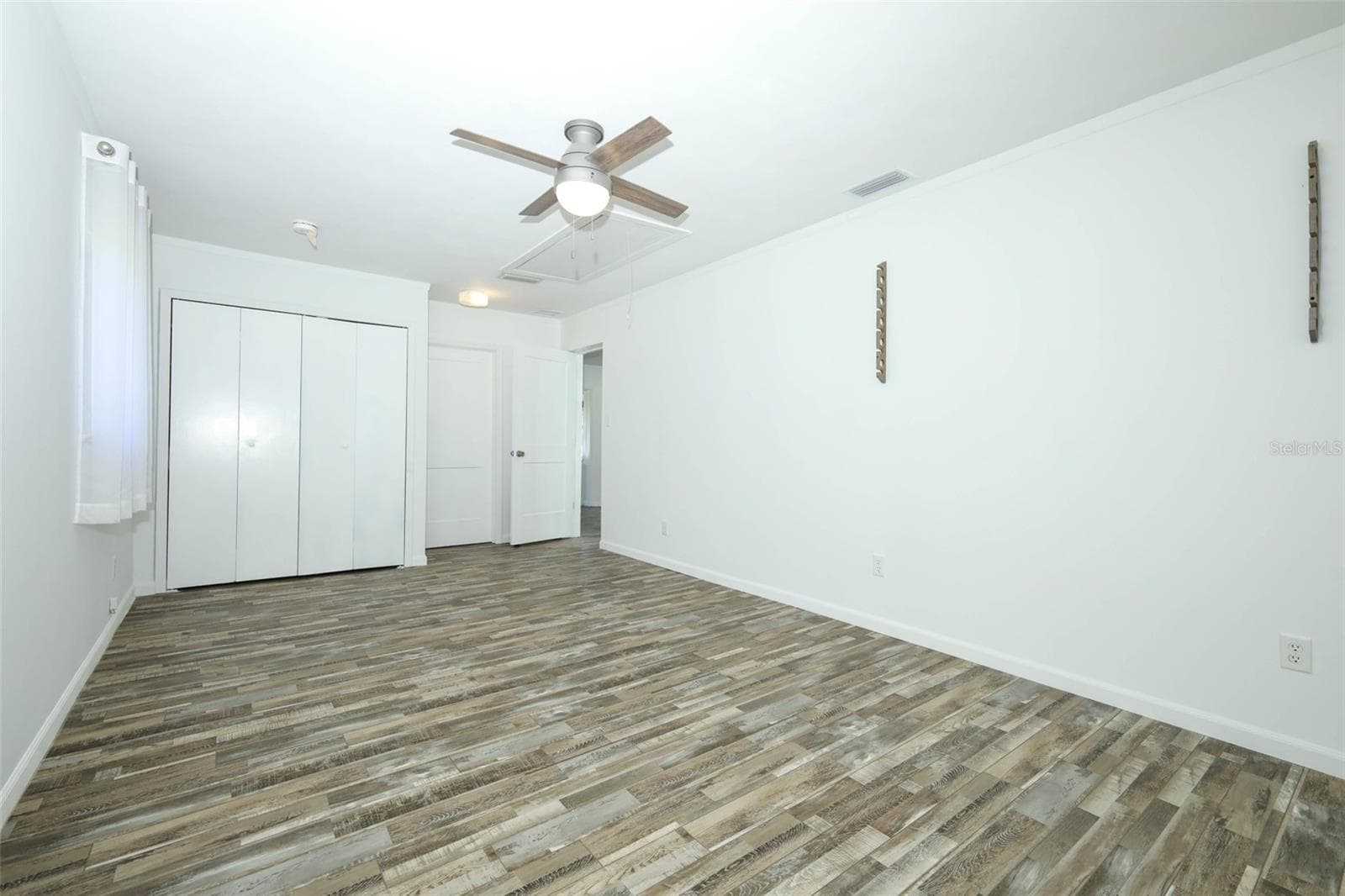 Primary Bedroom looking toward laundry and what could become 2nd bathroom - 60 PARK LN, DEBARY