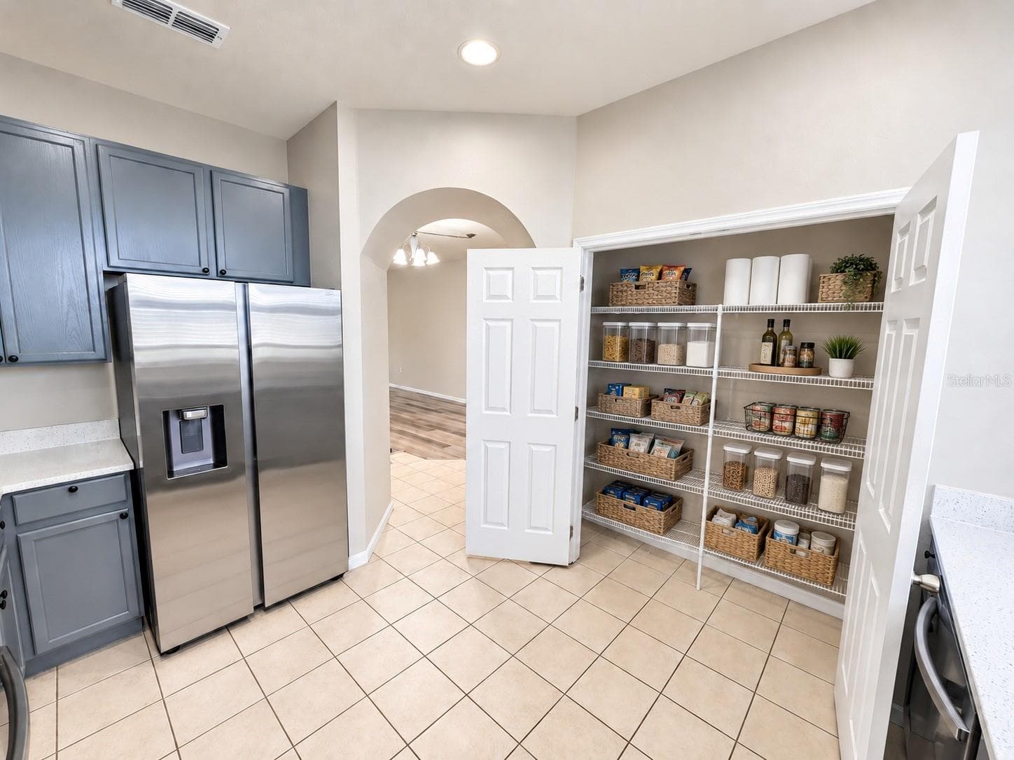 virtual staging - 4996 TOWN TER N, KISSIMMEE