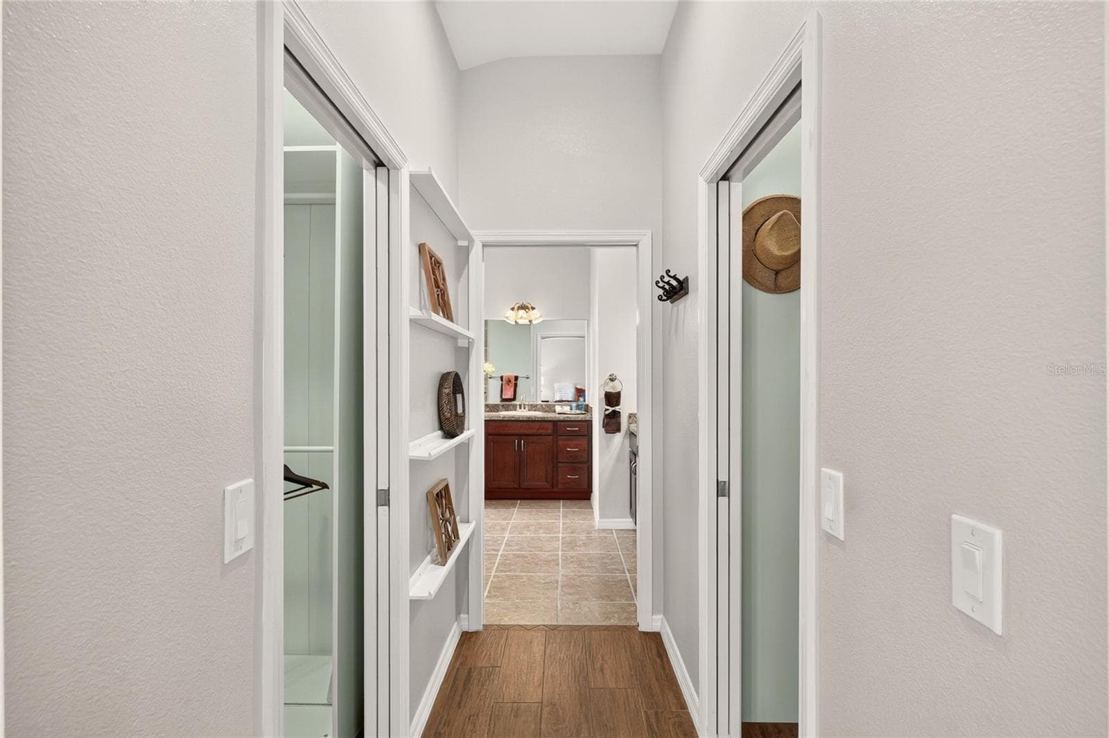 The GUEST WING features a convenient LINEN CLOSET and nearby guest bath, creating a comfortable space for visiting family and friends. - 2454 MORNING DOVE LN, THE VILLAGES
