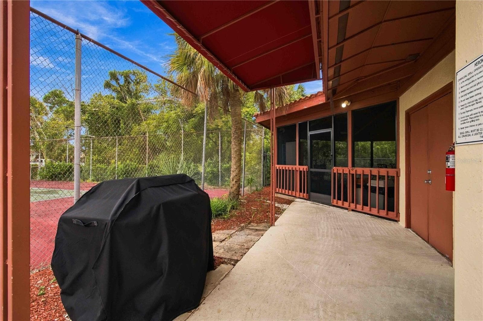 Clubhouse Exterior with BBQ Grill - 7500 40TH AVE W #105, BRADENTON