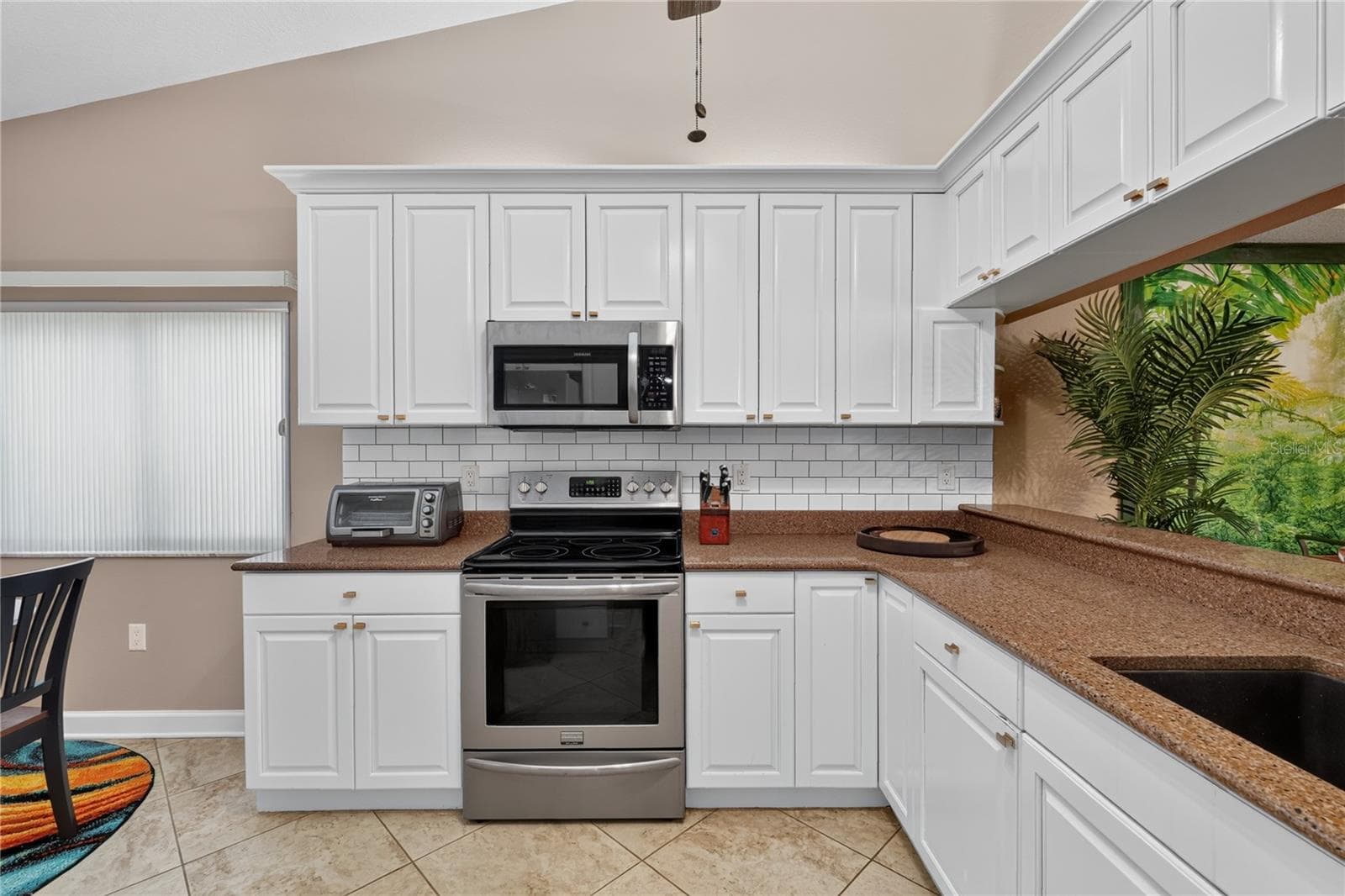 LARGE OPEN KITCHEN WITH AMPLE STORAGE - 6905 STONE RIVER, BRADENTON
