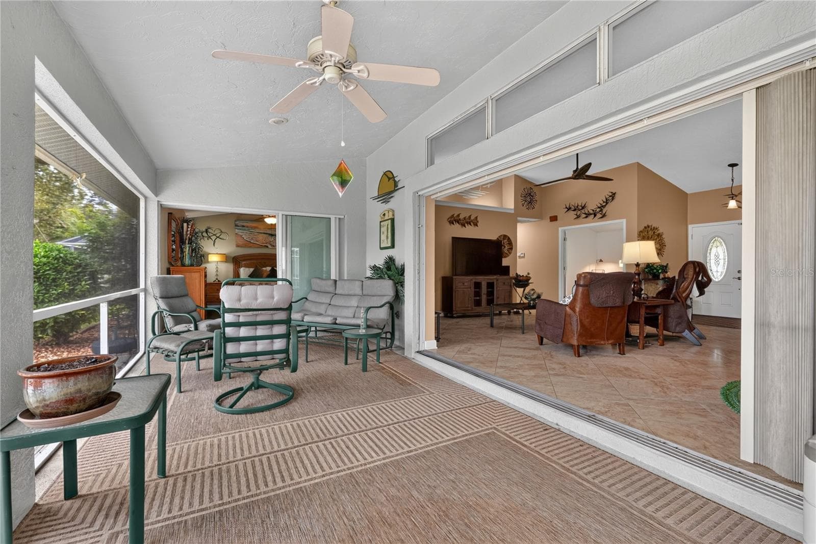LARGE SCREEN ENCLOSED LANIA WITH TRIPLE SLIDERS - 6905 STONE RIVER, BRADENTON