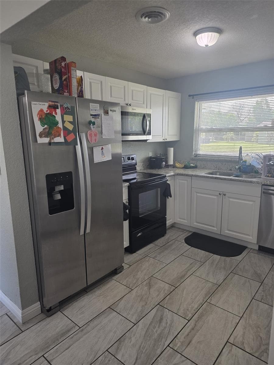 Single Family Residence at 1420 THOMAS ST, TITUSVILLE, photo 6 of 23