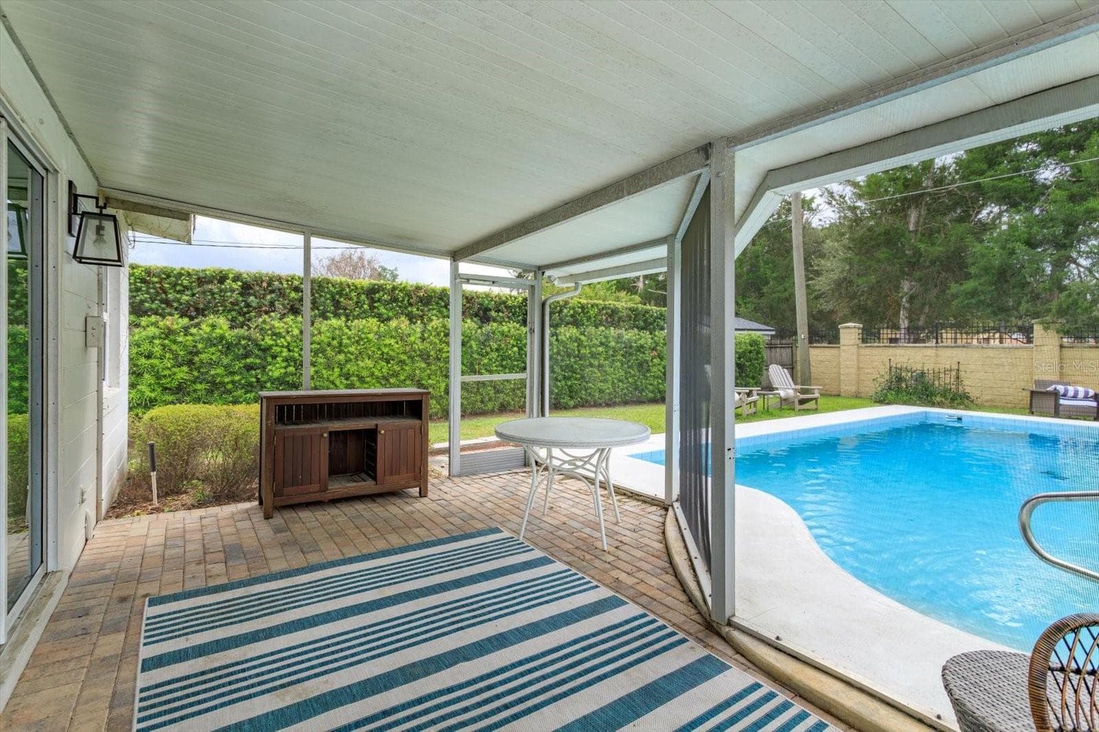 Screened in lanai with brick pavers - 2322 WOODCREST DR, WINTER PARK