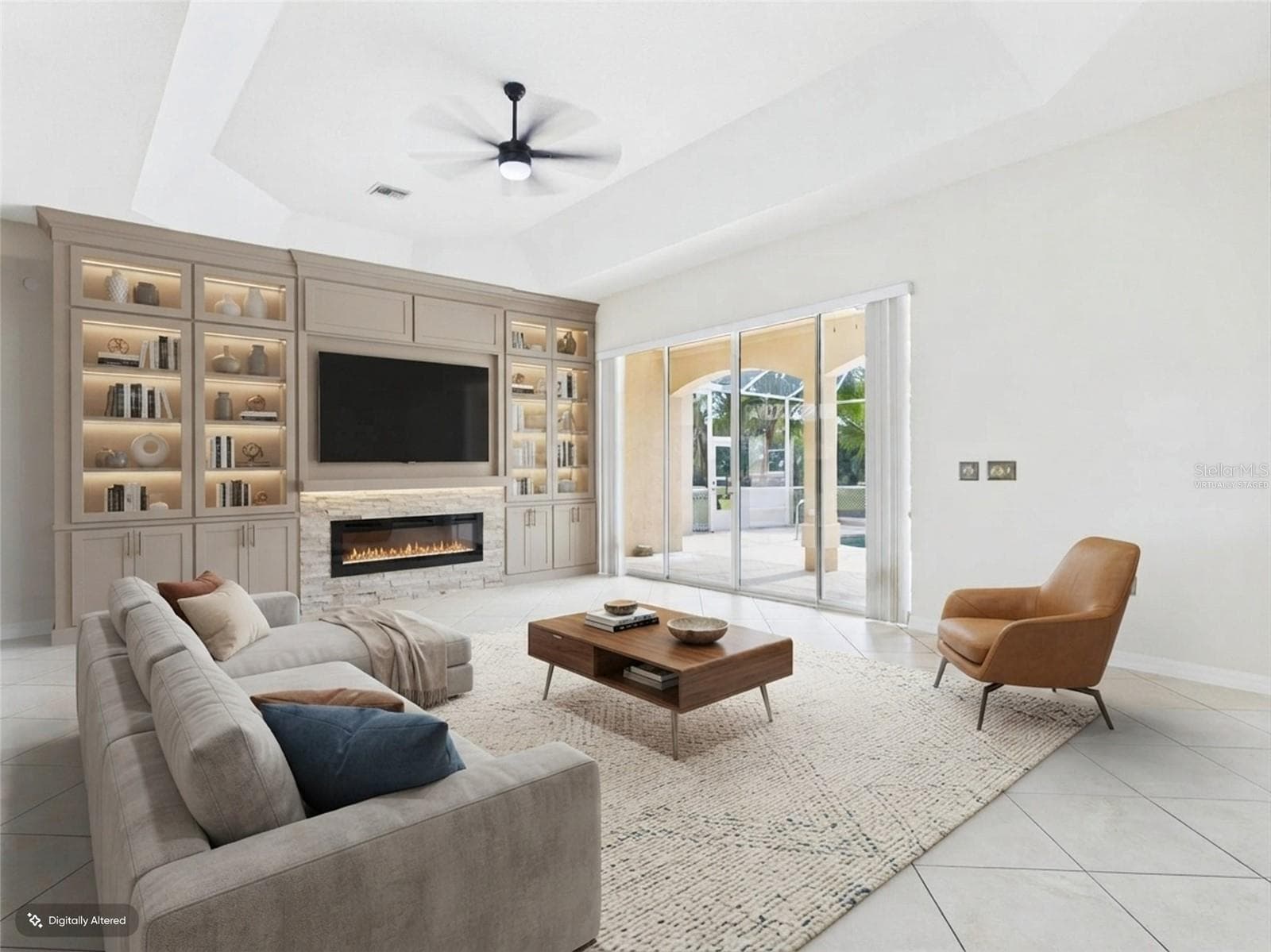 Living Room w/sliders to Pool - virtually staged - 1802 ESTAFANA WAY, THE VILLAGES