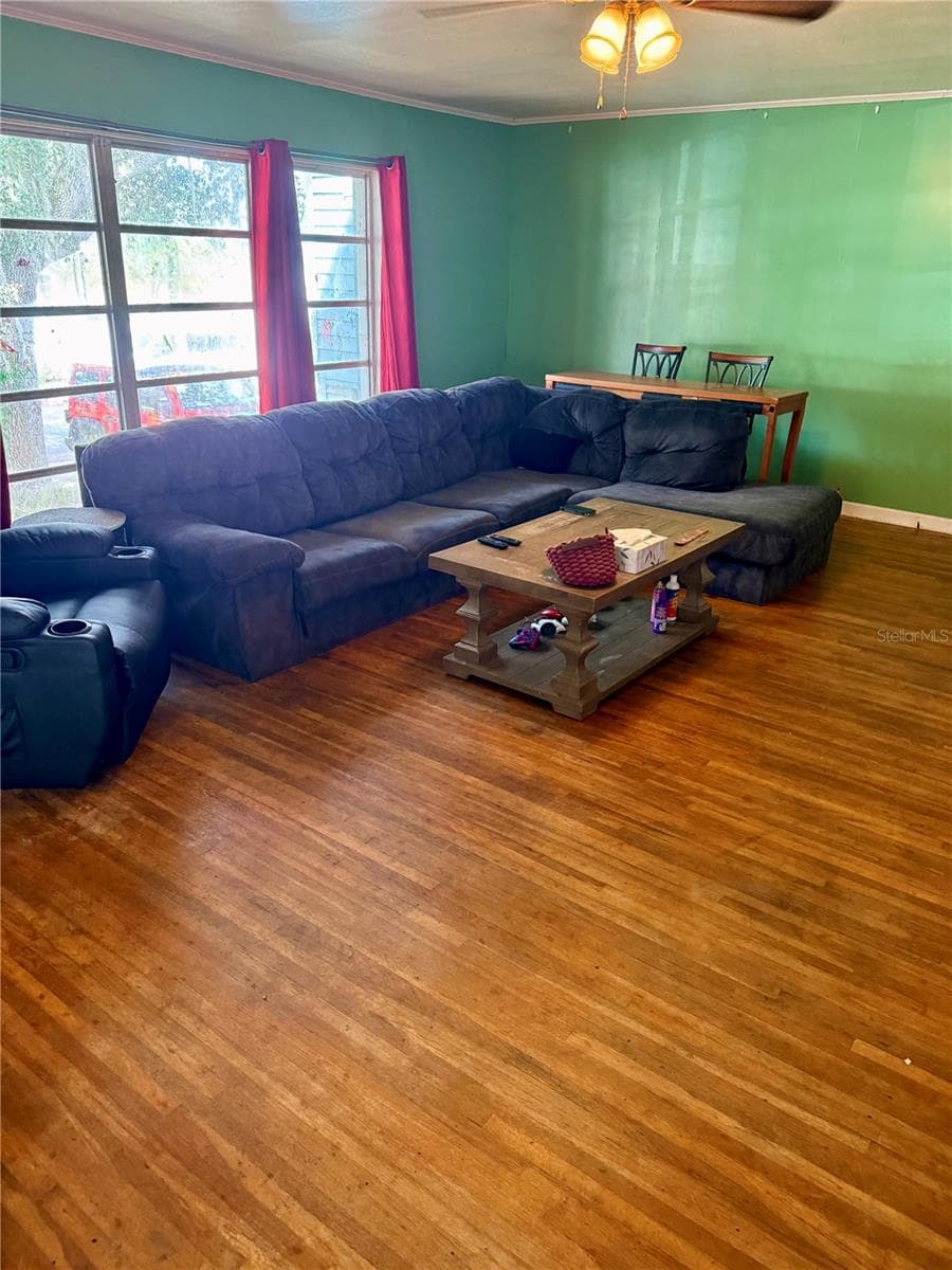 Living Room hardwood floors - 104 13TH ST SE, WINTER HAVEN